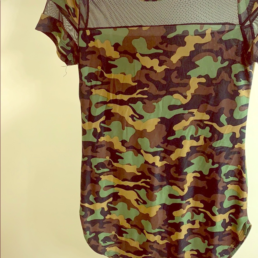 A camp top with sheer chest area.